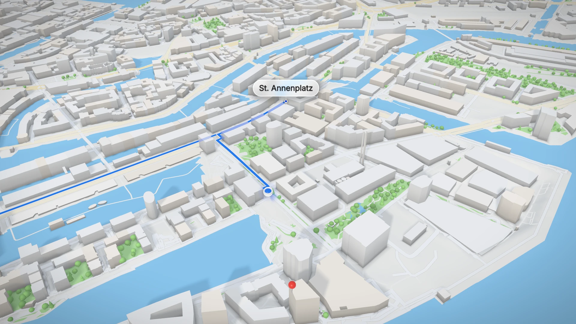 Die HafenCity als räumliche Szene mit Gebäuden, Wasser und Parkflächen.